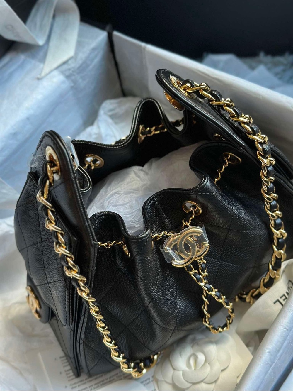 SOLD-CHANEL Mini Black Quilted Leather Drawstring Shoulder Bag with Gold Hardwar - Picture 1 of 8
